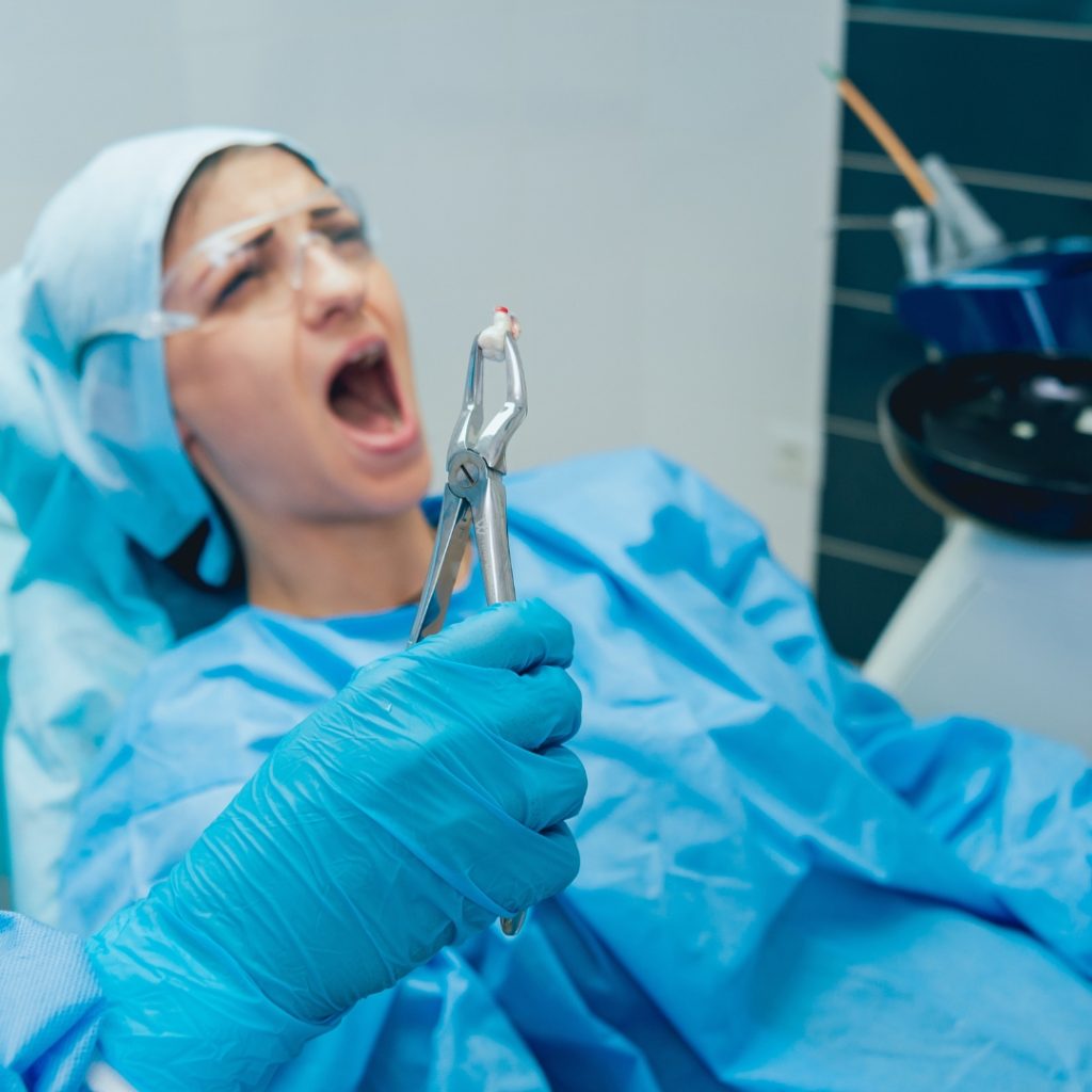 Patient in the chair during a tooth extraction
